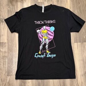 🖤 Raskol Apparel “Thick Thighs Crush Guys” Graphic Tee – Retro Synthwave